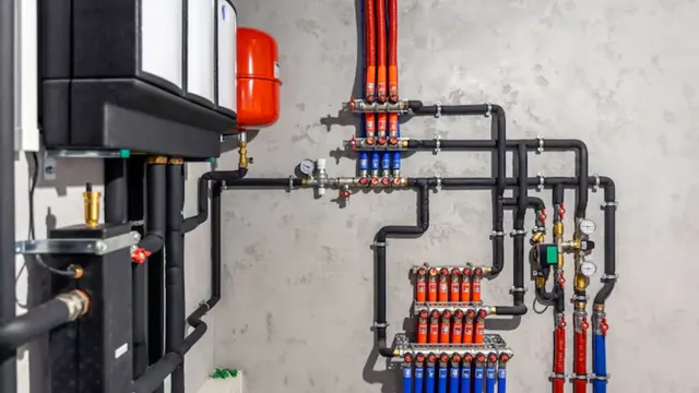 Boiler piping manifold with insulated supply and return lines.